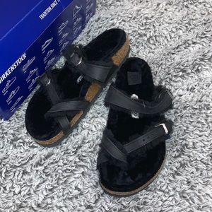 Black fur Birkenstock’s